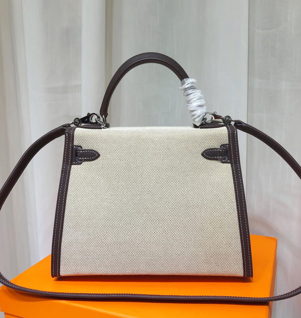 Kelly 25 Bag With Exterior Stitching Crafted Of Patchwork Canvas & Premium Swift Leather, Classic Deep Ebony Wood Shade, Unique Mixed Material Texture With Distinct Vintage Charm Dimensions: Length 25 * Width 10 * Height 18cm