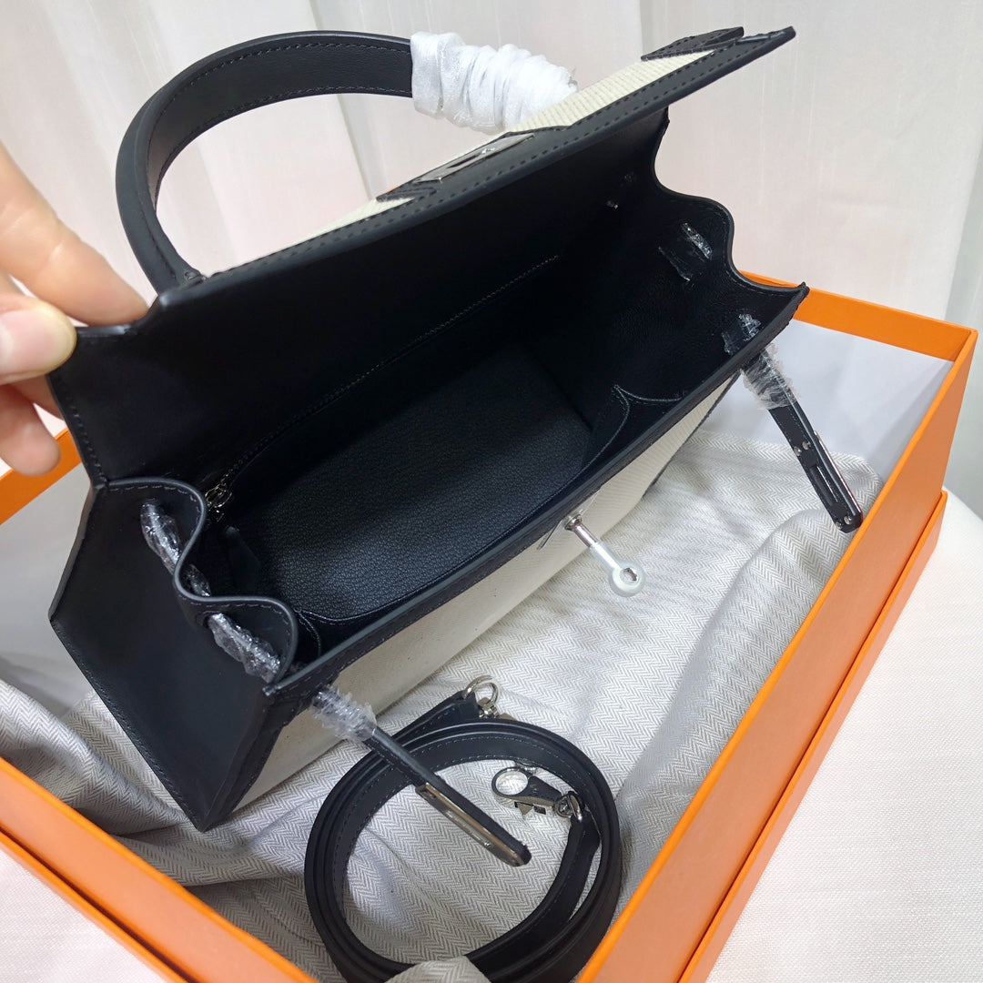 Top Selling Kelly 25 Bag With Outside Stitching, Made Of Textured Canvas & Soft Swift Leather Patchwork, Classic Black Silver Hardware Combination, Stunning Mixed Material Texture Dimensions: Length 25 * Width 10 * Height 18cm