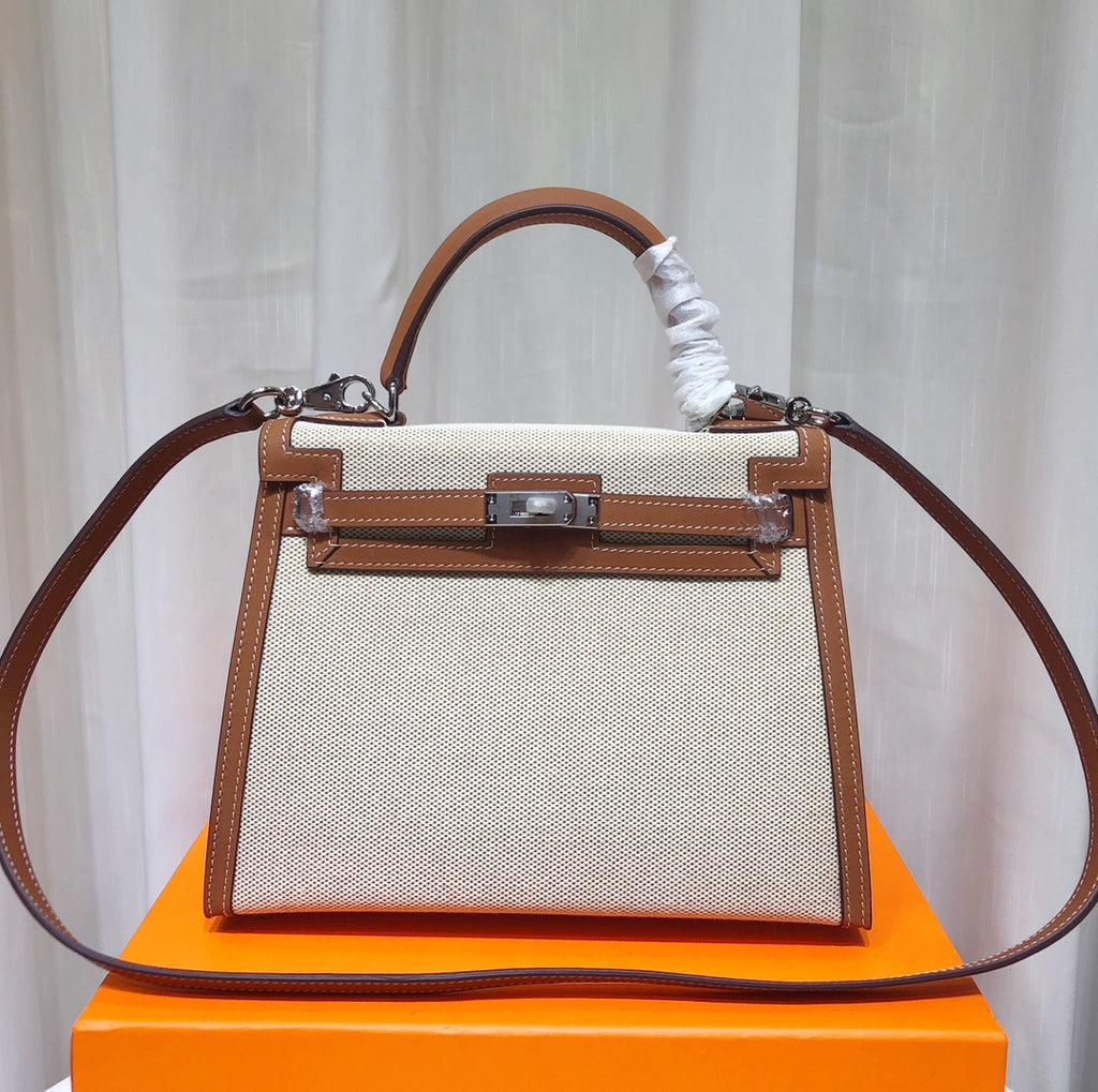 Kelly 25 Bag With Outside Stitching Constructed Of Patchwork Canvas & Premium Soft Swift Leather, Rich Warm Brown Tone Delivers Full-Bodied Vintage Luxury Texture Dimensions: Length 25 * Width 10 * Height 18cm